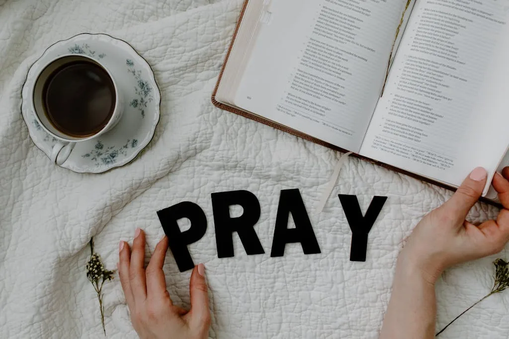 Left & Right Ear Itching Meaning, Superstition Spiritually 7 A Person Reading a Book Beside the Black Text and Coffee